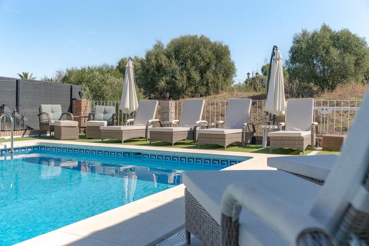 Villa en Venta en Coín